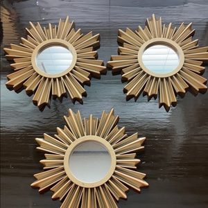 Set of three starburst wall hangings